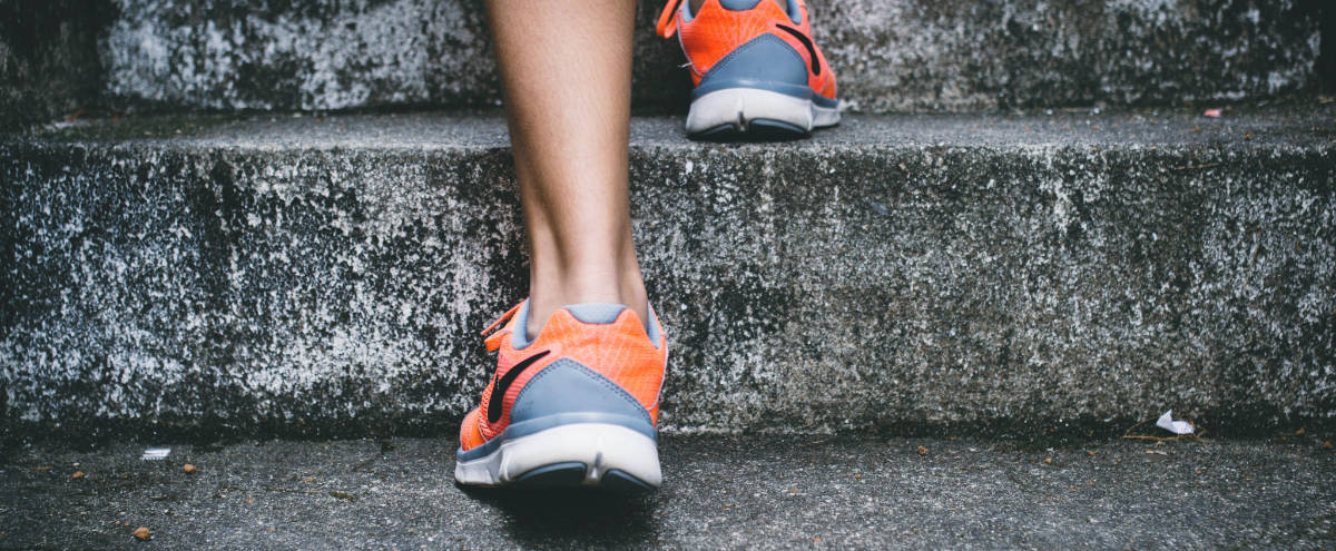 Close-up of someone walking up some steps