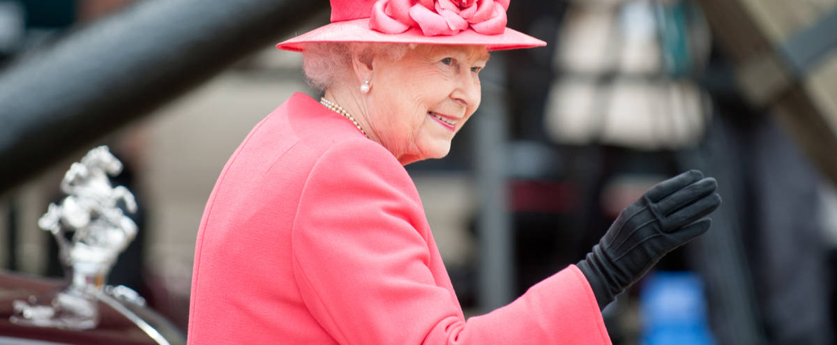 Queen Elizabeth II waving in Liverpool.