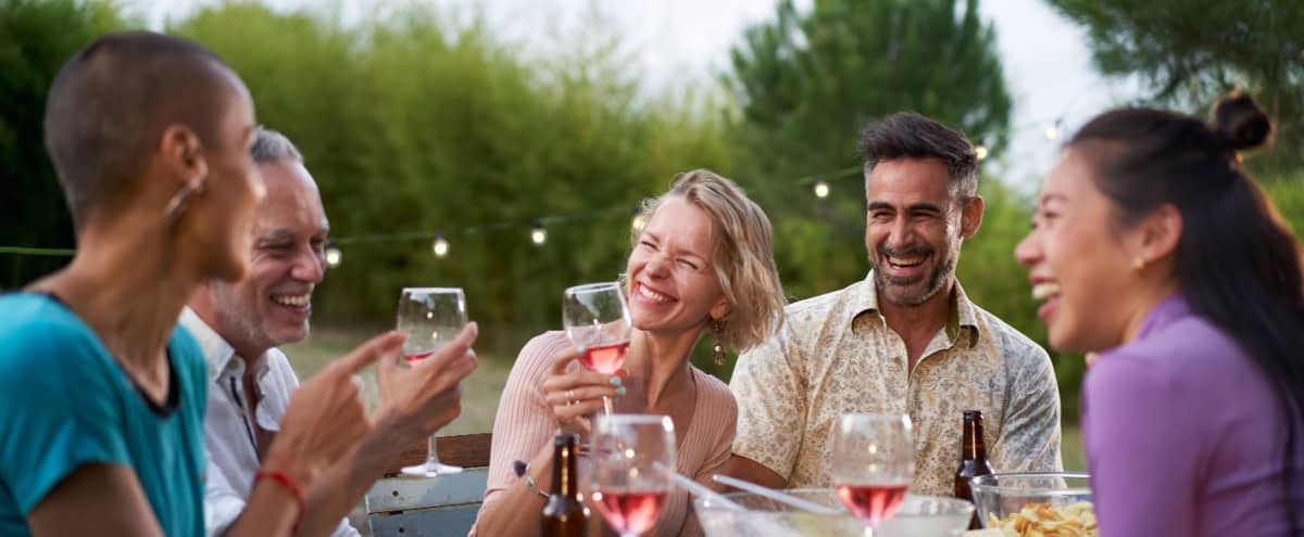 A group of friends dining outside.